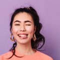 Happy Asian Girl Making Funny Faces Front View Of Utc - Legal Marketing Services. | Google Ads Digital Marketing Agency in California