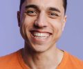 Young Brunette White Man Smiling And Looking At Ca Utc - Google Ads Management | Google Ads Digital Marketing Agency in California
